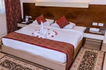 Кровать или кровати в номере Golden Beach Resort