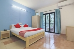 Кровать или кровати в номере OYO Flagship 19721 Prazeres Resort