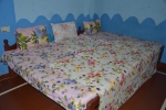 Кровать или кровати в номере Fisherman Guest House