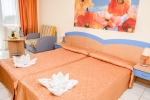 Кровать или кровати в номере Dolphin Hotel All Inclusive