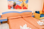 Кровать или кровати в номере Dolphin Hotel All Inclusive