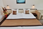 Кровать или кровати в номере Hotel Marvel