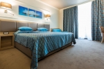 Кровать или кровати в номере Tiara Beach - All Inclusive