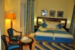 Кровать или кровати в номере Nubian Village Aqua Hotel