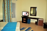 Телевизор и/или развлекательный центр в Nubian Village Aqua Hotel