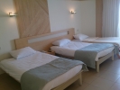 Кровать или кровати в номере Eden Rock Hotel Namaa Bay