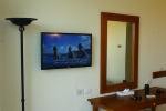Телевизор и/или развлекательный центр в Eden Rock Hotel Namaa Bay