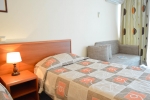 Кровать или кровати в номере Hotel Laguna Garden - All Inclusive