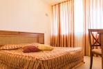 Кровать или кровати в номере Caesar Palace - All Inclusive