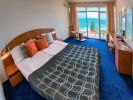 Кровать или кровати в номере Luna Hotel - Balneo & Spa