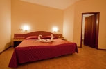 Кровать или кровати в номере Ljuljak Hotel