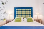 Кровать или кровати в номере Belvedere Gerakas Luxury Suites