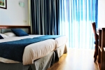 Кровать или кровати в номере Hotel Marbel