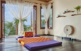 Кровать или кровати в номере DoubleTree by Hilton Seychelles Allamanda Resort & Spa