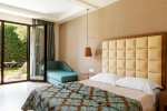 Кровать или кровати в номере Mediterranean Village Hotel & Spa