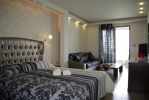 Кровать или кровати в номере Dion Hotel