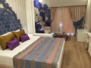 Кровать или кровати в номере Delphin BE Grand Resort