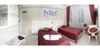 Кровать или кровати в номере Savk Hotel
