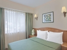 Кровать или кровати в номере Akka Claros Hotel