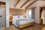 Кровать или кровати в номере Sea Side Resort & Spa