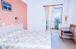 Кровать или кровати в номере Corfu Senses Resort