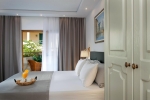 Кровать или кровати в номере Possidi Holidays Resort & Suite Hotel