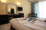 Кровать или кровати в номере King Tut Aqua Park Beach Resort
