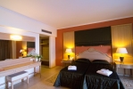 Кровать или кровати в номере The Kresten Royal Villas & Spa