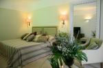 Кровать или кровати в номере Sensimar Elounda Village Resort & Spa by Aquila