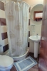 Ванная комната в Porto Daliani