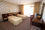 Кровать или кровати в номере Izola Paradise Hotel - All Inclusive