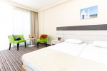 Кровать или кровати в номере Christofinia Hotel