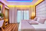 Кровать или кровати в номере Porto Marine Hotel