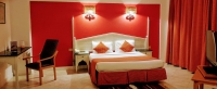 Кровать или кровати в номере Flamenco Beach & Resort Quseir