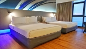 Кровать или кровати в номере Ambassador City Jomtien Marina Tower Wing