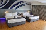 Кровать или кровати в номере Ambassador City Jomtien Marina Tower Wing