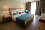 Кровать или кровати в номере Danai Hotel & Spa