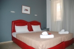 Кровать или кровати в номере Yiannis Apartments 