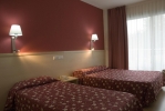 Кровать или кровати в номере Hotel Surf Mar