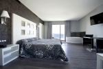 Кровать или кровати в номере Hotel Surf Mar