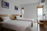 Кровать или кровати в номере Golden Holiday Hotel