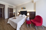 Кровать или кровати в номере Golden Age Bodrum Hotel All Inclusive