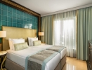 Кровать или кровати в номере Rixos Premium Bodrum