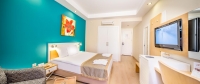 Кровать или кровати в номере Crystal Green Bay Resort & Spa