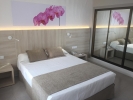 Кровать или кровати в номере Sunlight Bahia Principe Coral Playa