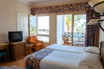 Кровать или кровати в номере Coral Beach Resort Montazah (Ex. Rotana)