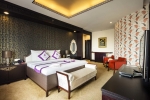 Кровать или кровати в номере TTC Hotel Premium - Michelia
