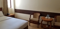 Кровать или кровати в номере Viet Sky Hotel