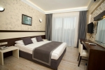 Кровать или кровати в номере Camyuva Beach Hotel
