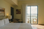 Кровать или кровати в номере Hotel NYX Cancun